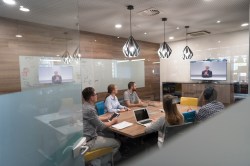 start up business people group attending videoconference call with senior investitior at modern office
